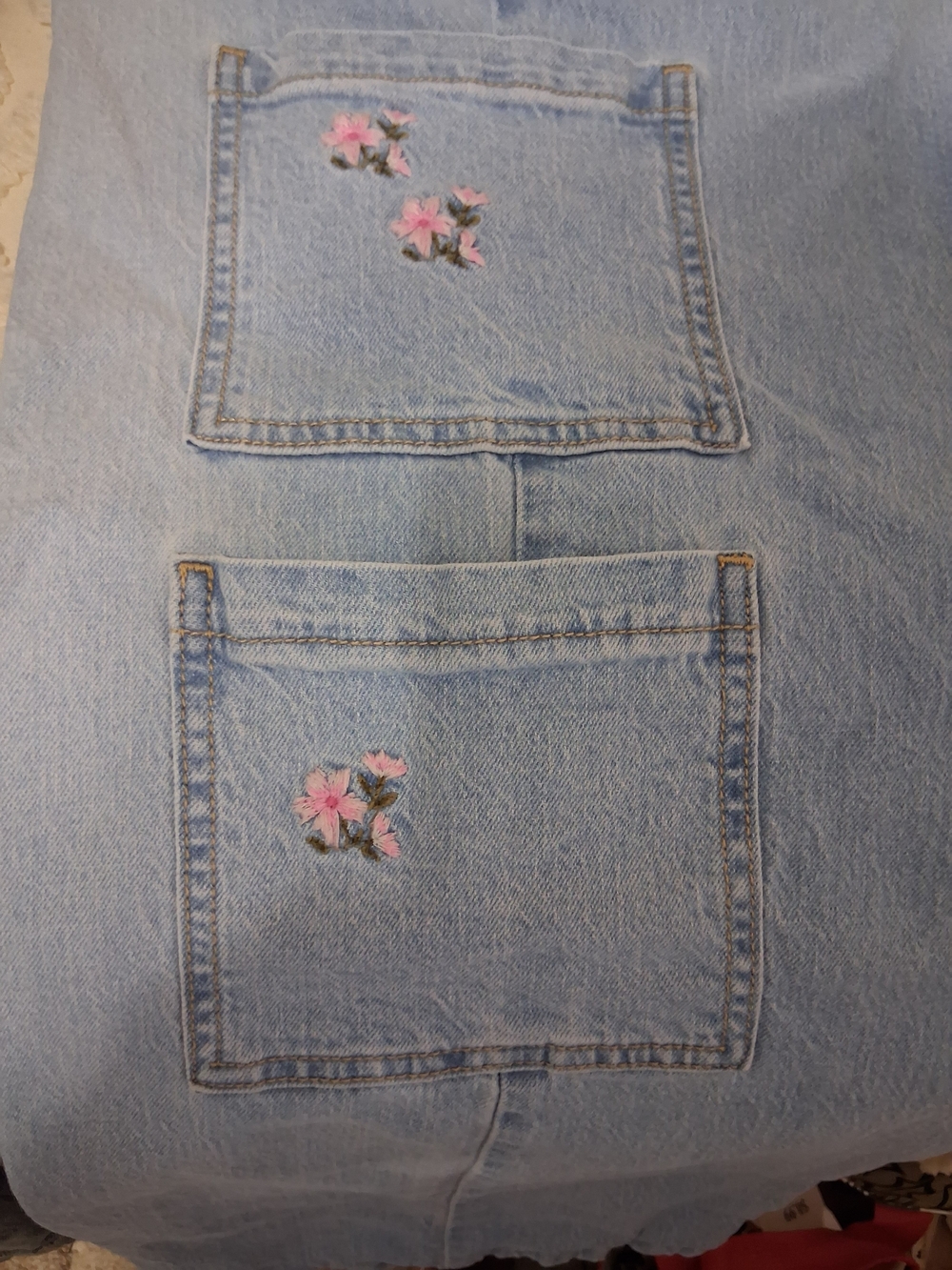 Light Blue Bootcut Jeans with Pink Embroidered Pockets